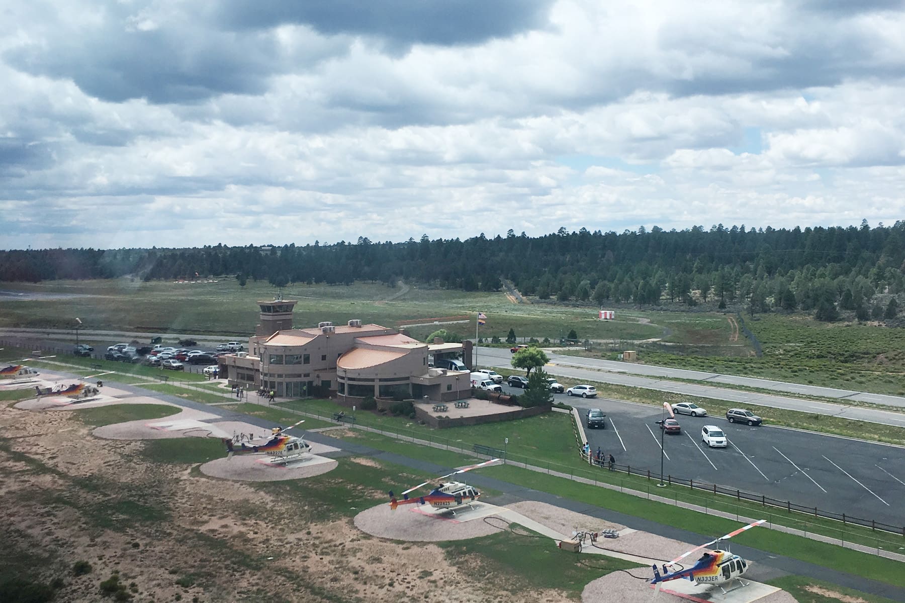 Helicopters parked in a Papillon helicopter parking lot.