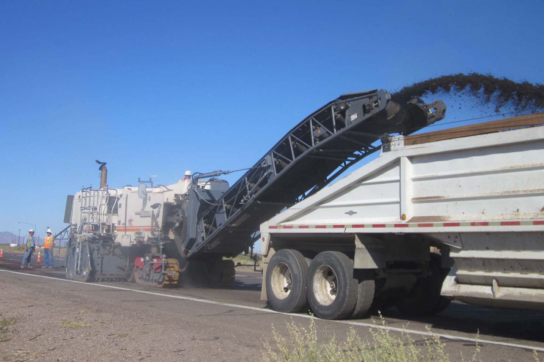 A truck with a dump truck on Yuma – Casa Grande Hwy.
