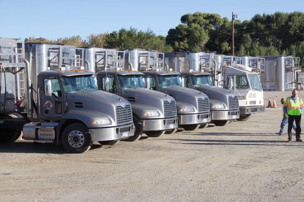 A row of Solid Waste trucks.